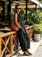 Zaria | Ärmelloser Utility-Jumpsuit mit weitem Bein" could be rewritten as: "Zaria | Ärmelloser Utility-Jumpsuit mit weitem Schnitt